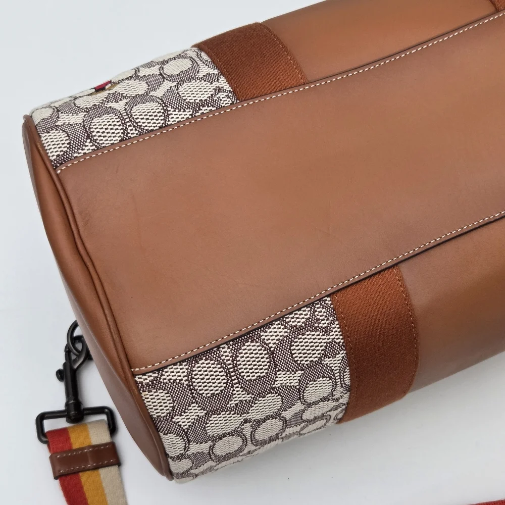 DISNEY X COACH DUFFLE BAG - SIGNATURE TEXTILE JACQUARD MICKEY MOUSE AND FRIENDS